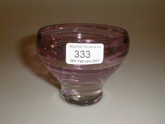 Appraisal: A shaded and slightly ribbed pink glass bowl with heavy