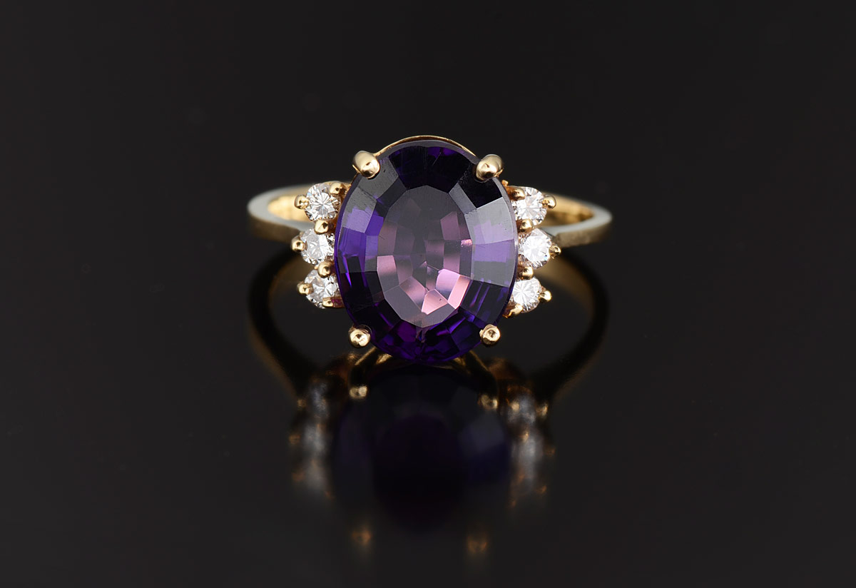 Appraisal: CT AMETHYST FASHION RING K yellow gold ring centers a