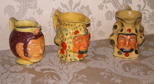 Appraisal: Title Yellow Ware Satyr Mask Mugs two English th Century