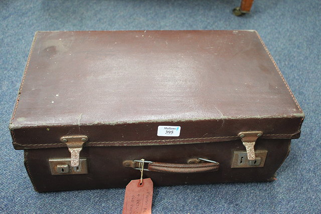 Appraisal: AN OLD SUITCASE containing a number of watch makers parts