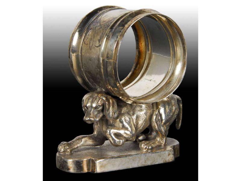 Appraisal: Crouching Hunting Dog Figural Napkin Ring Description Marked Simpson Hall