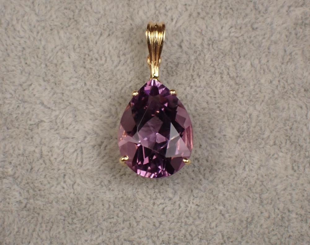 Appraisal: AMETHYST AND FOURTEEN KARAT GOLD ENHANCER PENDANT k yellow gold