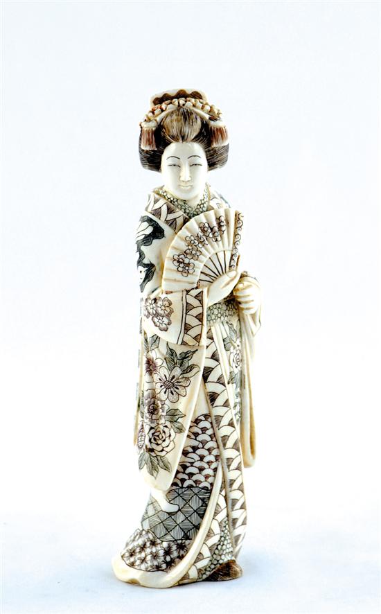 Appraisal: Japanese carved ivory okimono fancifully robed geisha holding fan signed