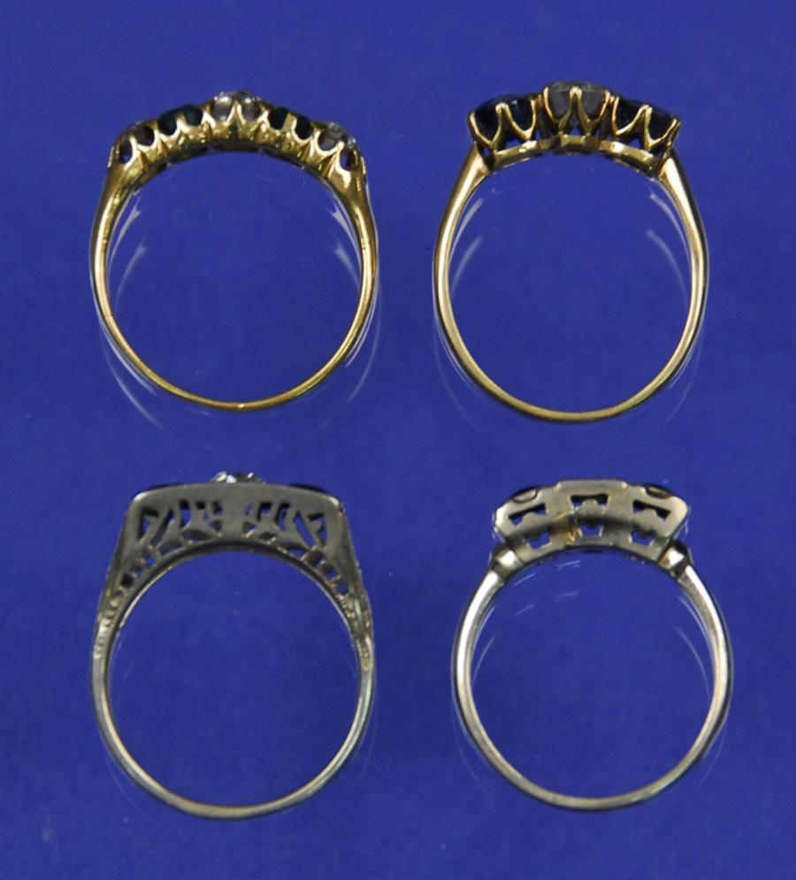 Appraisal: FOUR GOLD AND GEM SET RINGS including one k white