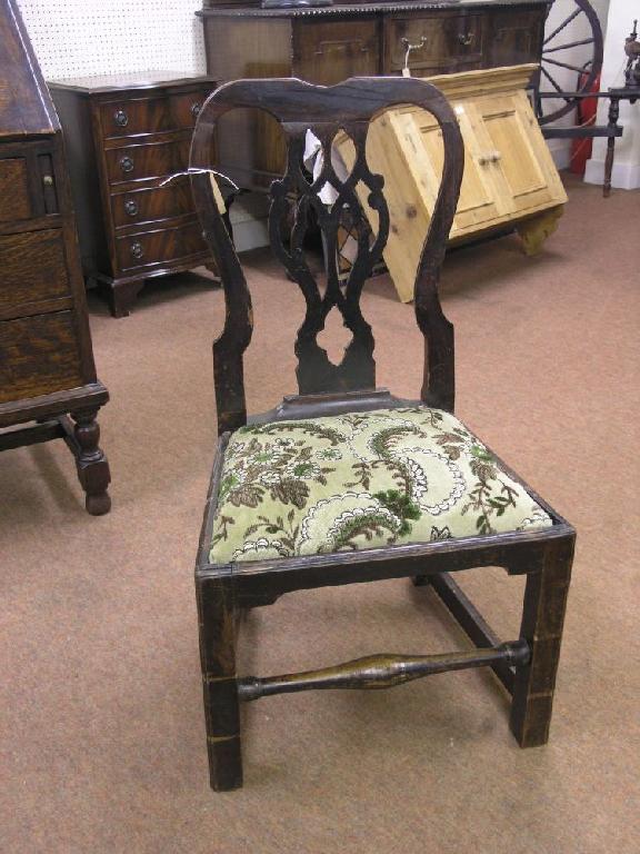 Appraisal: A Chippendale style child's chair with interlaced splat drop-in seat