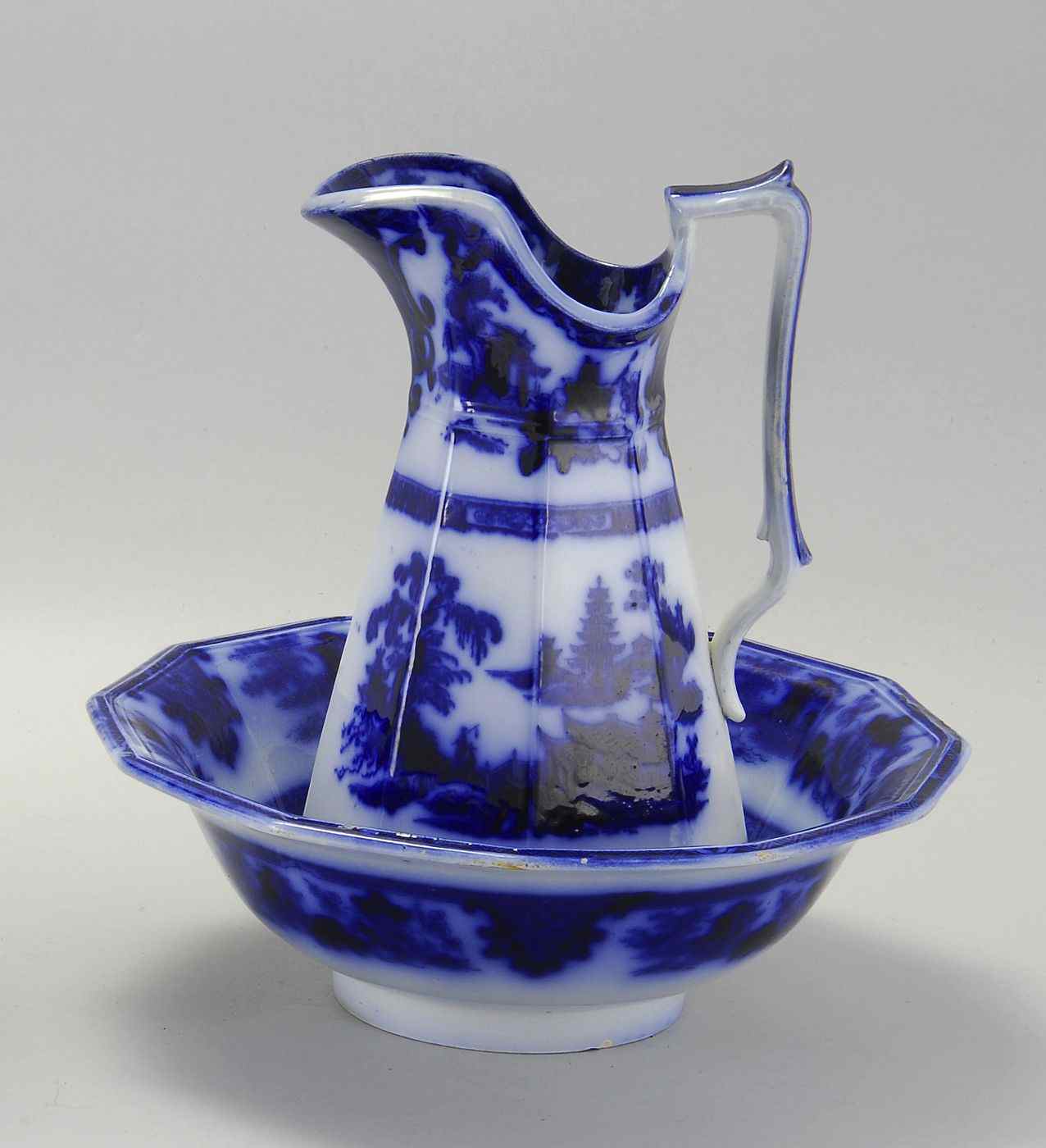 Appraisal: FLOW BLUE WASHBOWL AND PITCHERSecond Quarter of the th CenturyBy