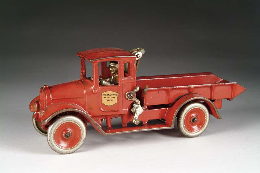 Appraisal: RED BABY DUMP TRUCK Manufactured by Arcade Mfg Co Red