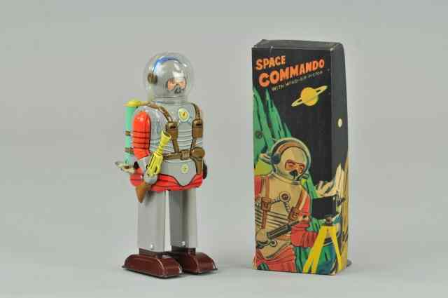 Appraisal: SPACE COMMANDO ROBOT Japan lithographed tin features celluloid dome with