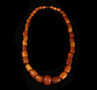 Appraisal: Amber Necklace Amber necklace Central bead mm Dia x mm