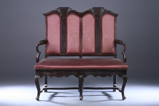 Appraisal: CONTINENTAL CARVED AND UPHOLSTERED DOUBLE CHAIR-BACK OPEN- ARM SETTEE th