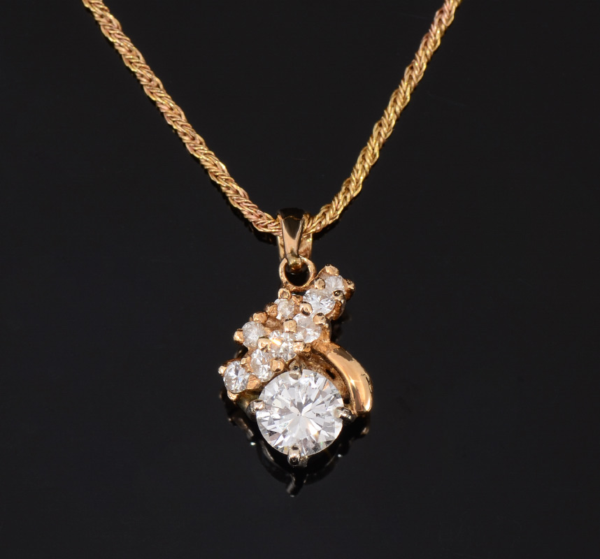 Appraisal: ESTATE DIAMOND PENDANT NECKLACE K yellow gold pendant contains one