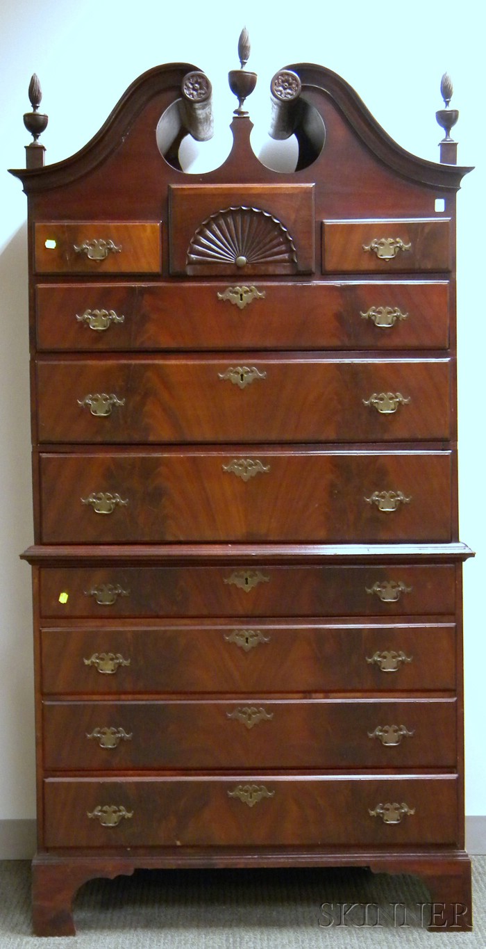 Appraisal: Chippendale-style Carved Mahogany and Mahogany Veneer Scroll-top Chest-on-Chest ht wd