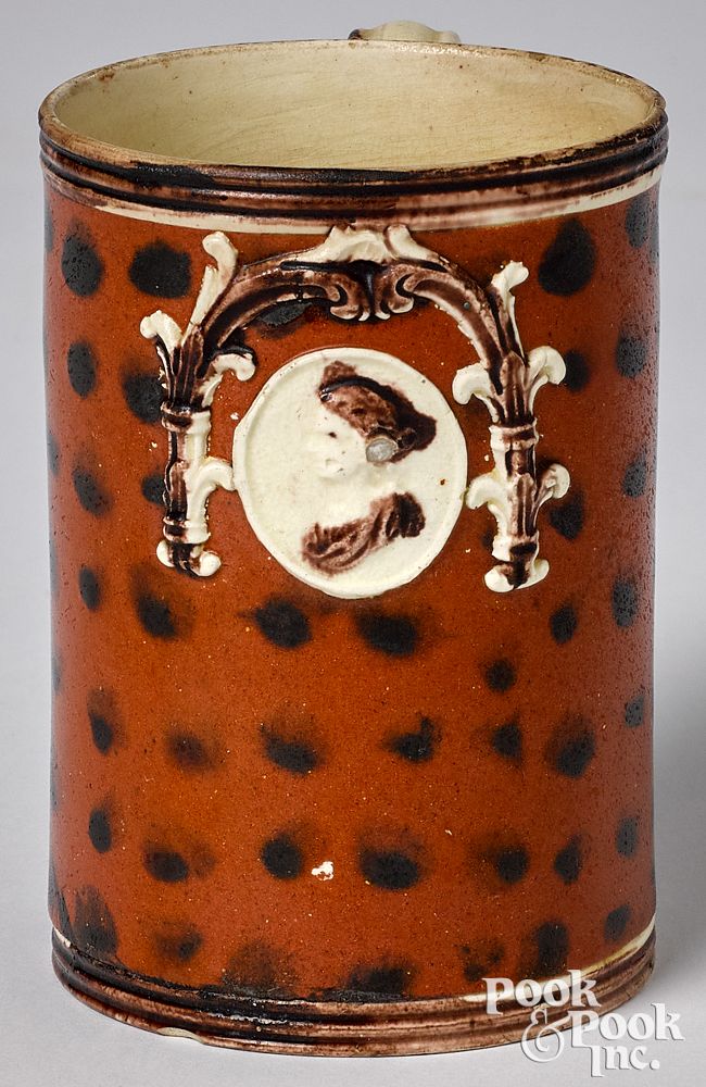 Appraisal: Mocha mug Mocha mug with dotted decoration on an umber