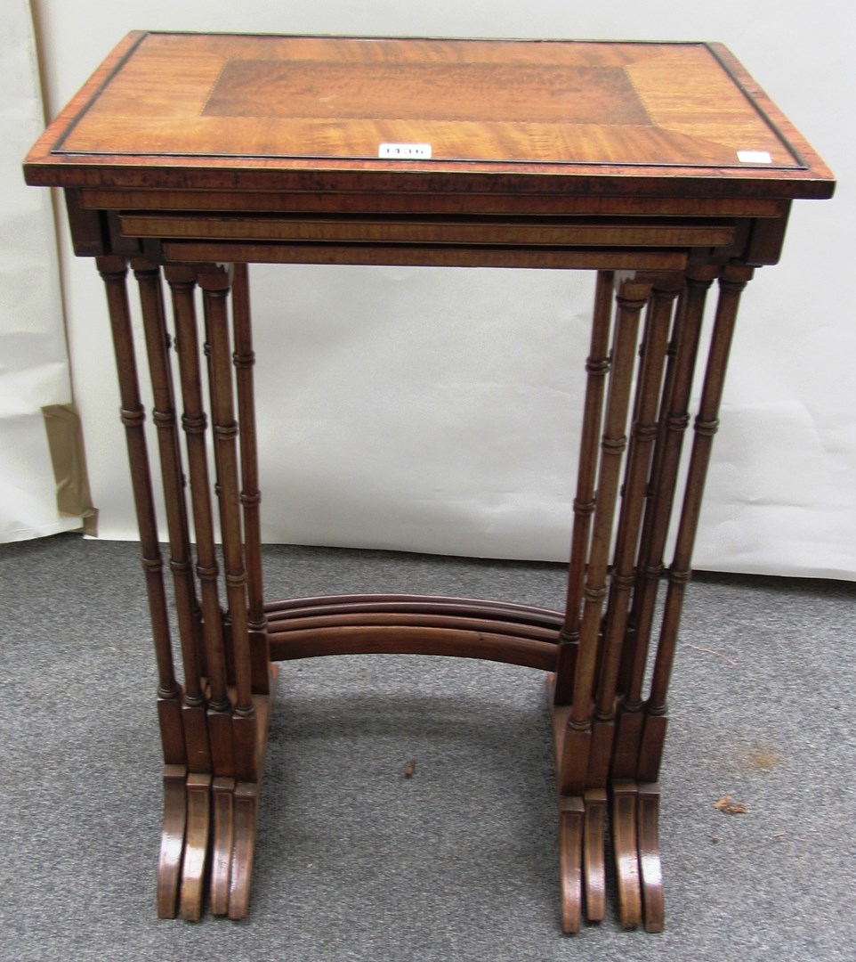 Appraisal: A nest of four Edwardian kingwood banded mahogany occasional table