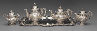 Appraisal: Portuguese silver tea service tray heavily chased with ornate scroll