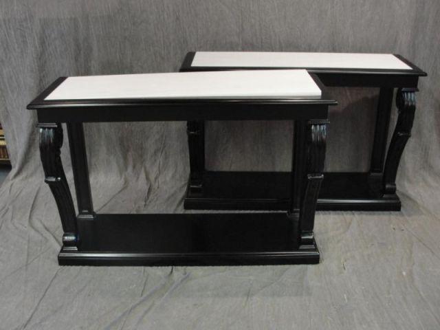 Appraisal: Pair of Black Lacquer Empire Style Marbletop Consoles From a