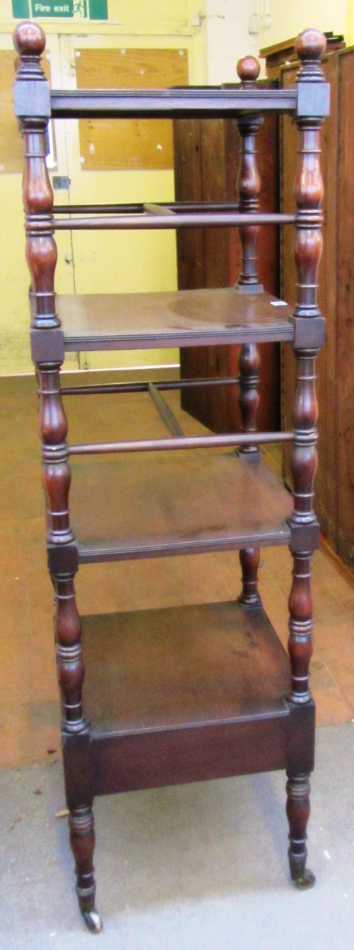 Appraisal: A th century mahogany four tier what-not the lower platform