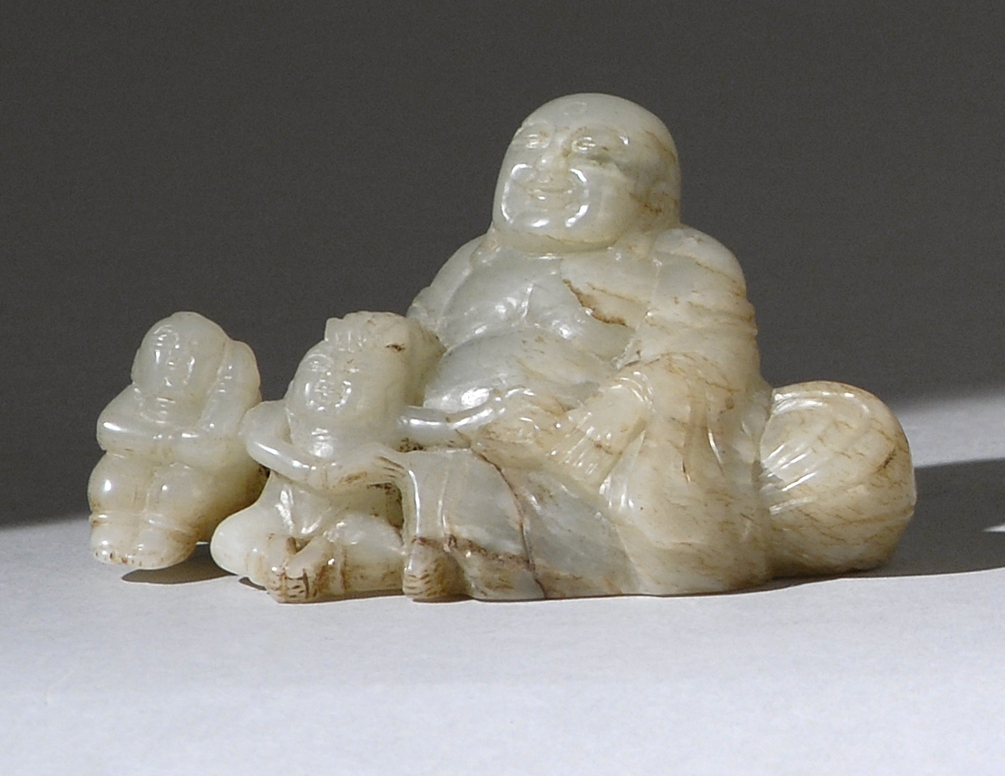 Appraisal: GRAY JADE CARVING Circa In the form of Joss seated