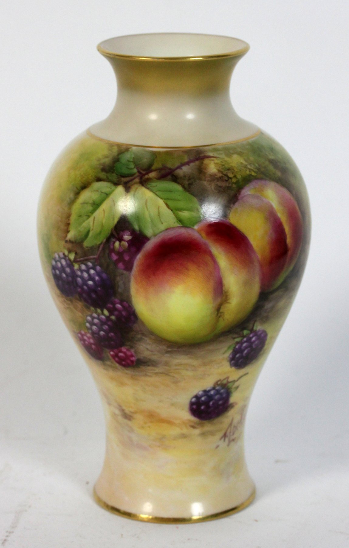 Appraisal: A Royal Worcester pear shaped vase painted plums and blackberries