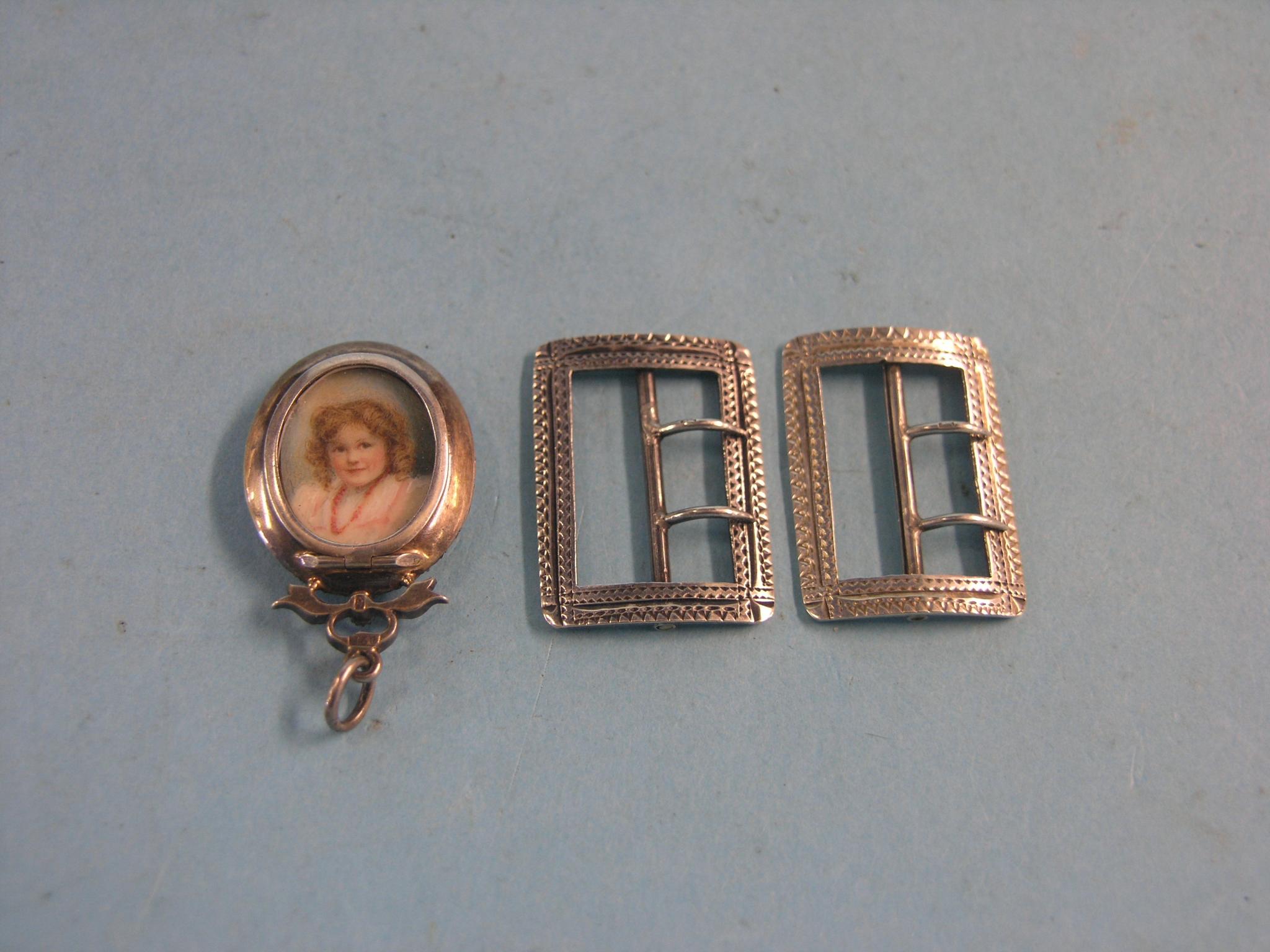 Appraisal: A pair of small engraved silver buckles Birmingham and a