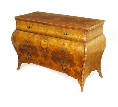 Appraisal: An Italian marquetry inlaid bombe commode to a walnut ground