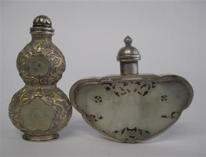 Appraisal: Two Chinese white jade and silver p lated snuff bottle