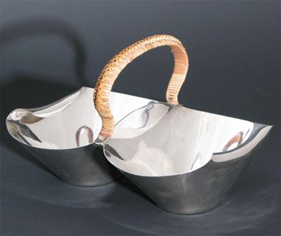 Appraisal: An Elkington electroplate twin bowl dish designed by Dr Christopher