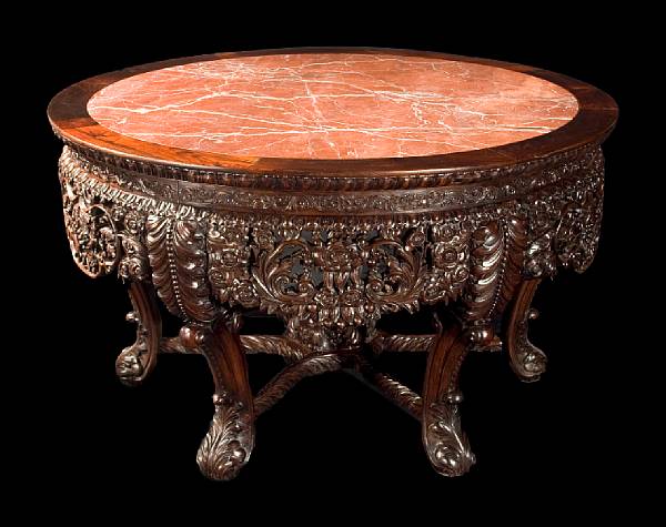 Appraisal: A Chinese carved rosewood center table th century The circular