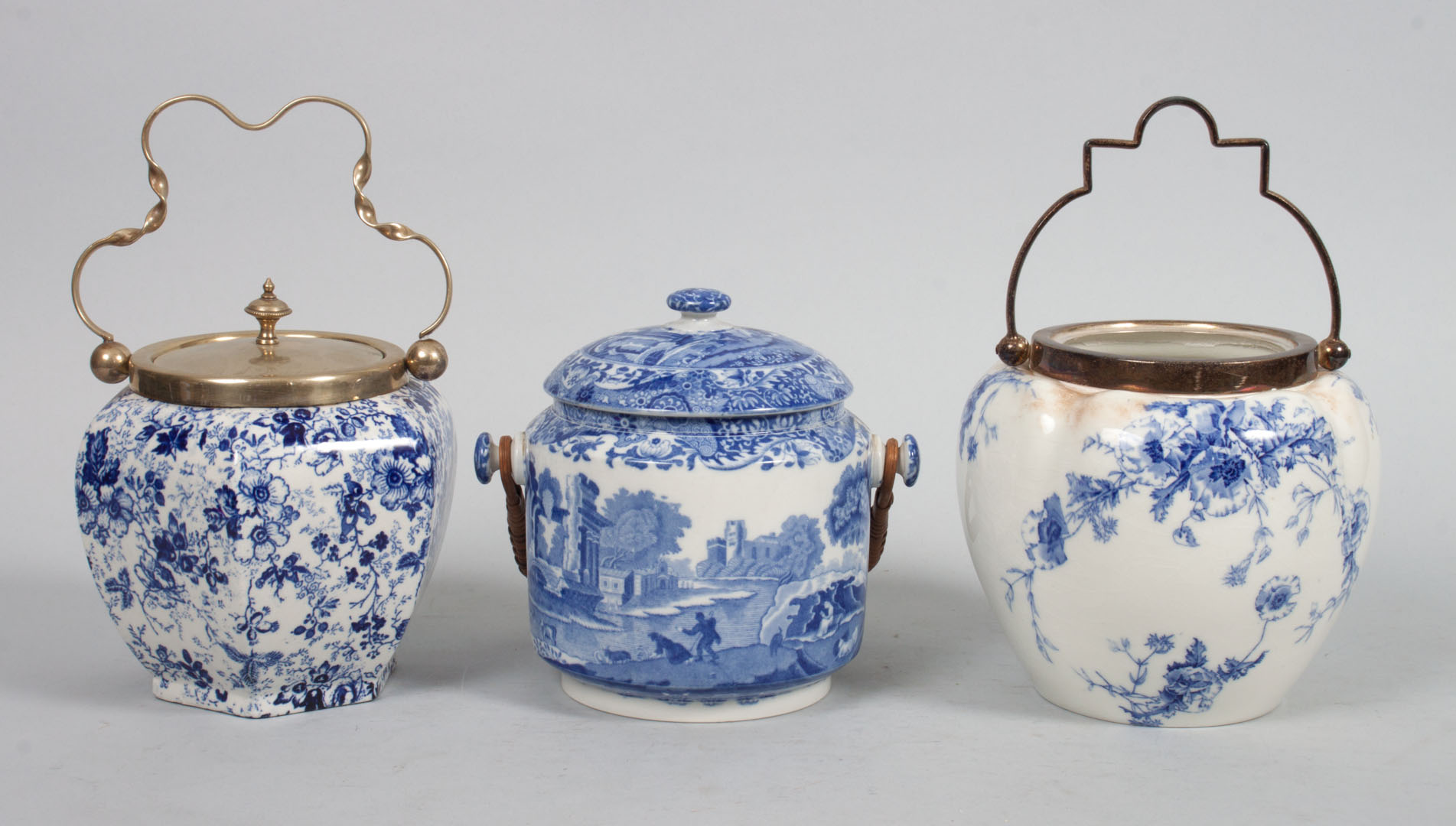 Appraisal: Three Staffordshire blue transferware biscuit jars th century Doulton Burslem