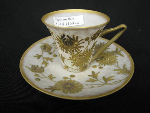 Appraisal: Crown Milano Victorian Art Glass Cup Saucer elaborate gold floral