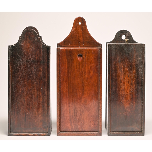 Appraisal: Three George III wall hanging candle boxes one of mahogany