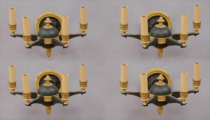 Appraisal: SET OF FOUR EMPIRE-STYLE BRONZE AND GILT-BRONZE FOUR-LIGHT WALL APPLIQUES