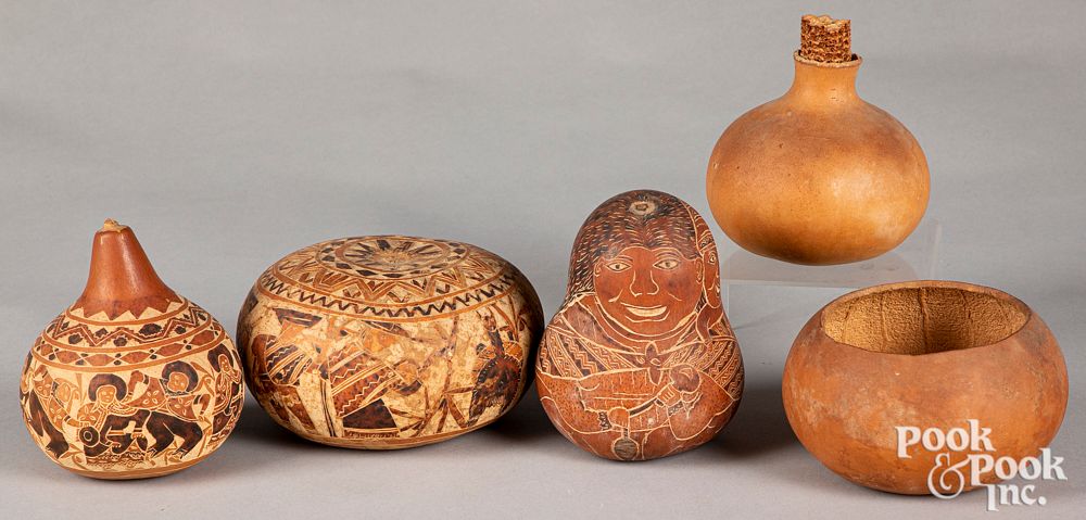 Appraisal: Three carved Peruvian gourds Three carved Peruvian gourds together with