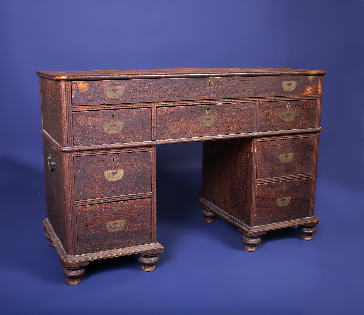 Appraisal: CAMPHORWOOD CAMPAIGN DESK In three parts the rectangular top with