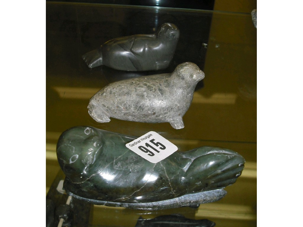 Appraisal: Three th century Inuit soapstone carvings of seals each long