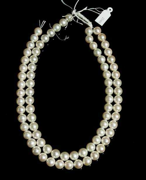 Appraisal: PAIR OF STRINGS OF PEARLS Each with Akoya cultured pearls