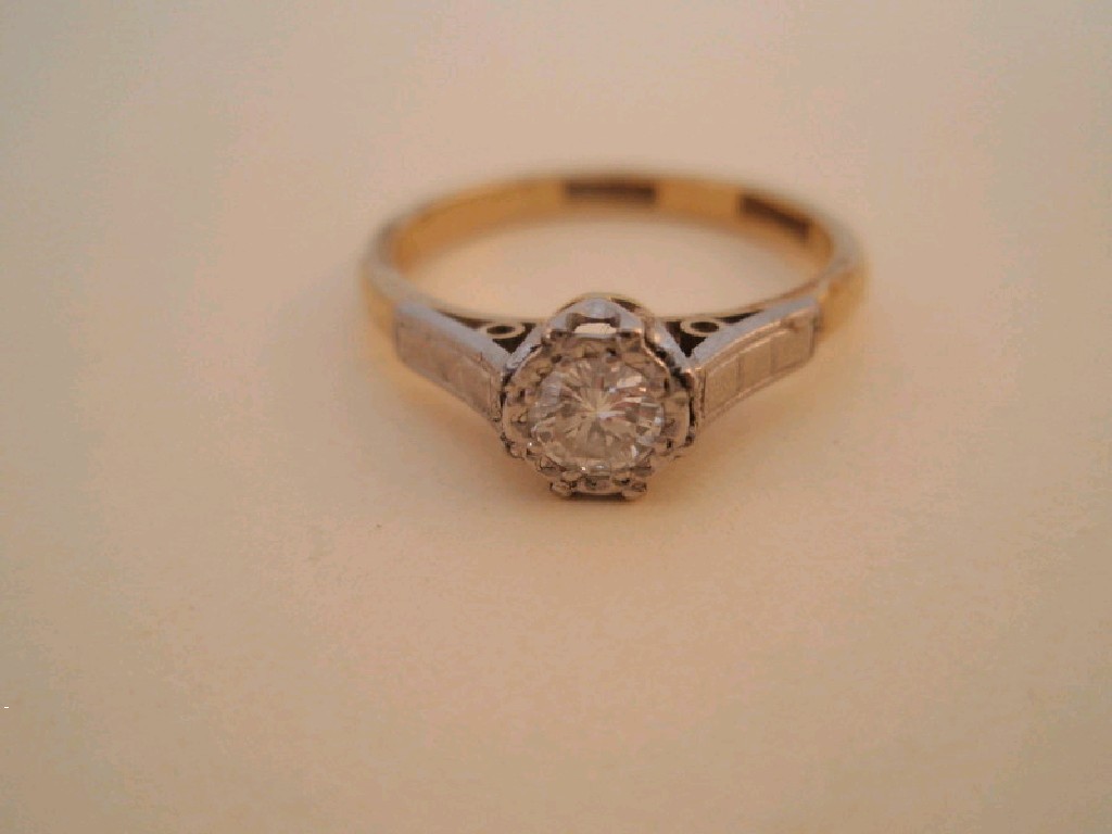 Appraisal: A solitaire diamond ring a round brilliant cut stone of