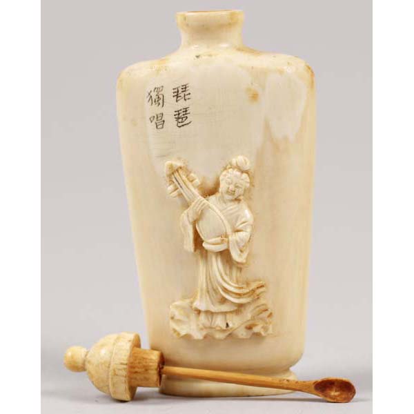 Appraisal: Carved snuff bottle with figure playing an instrument in relief