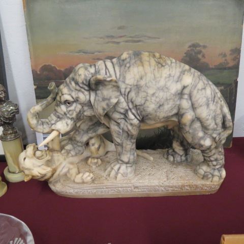 Appraisal: Carved Marble Elephant and Tiger Figurine ivory tusks wide tall