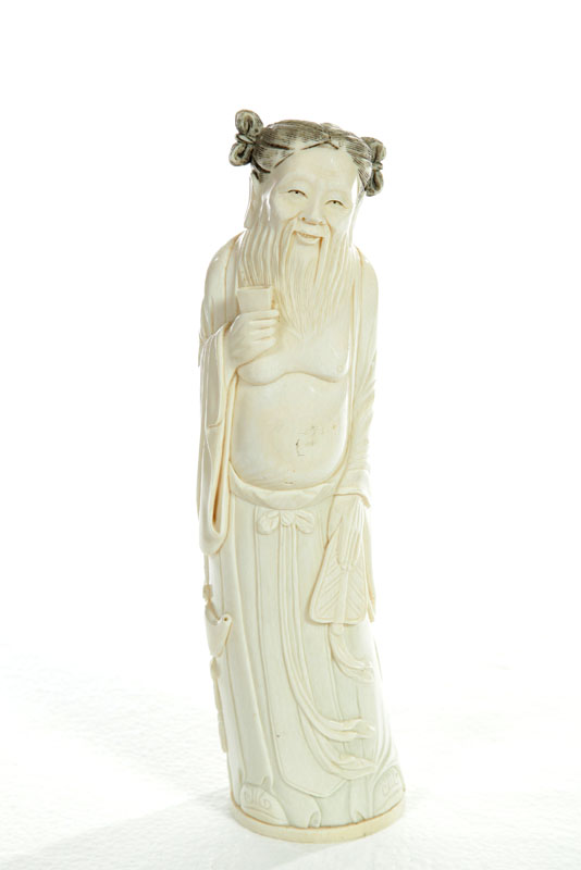 Appraisal: IVORY FIGURE China st half- th century Robed man carrying