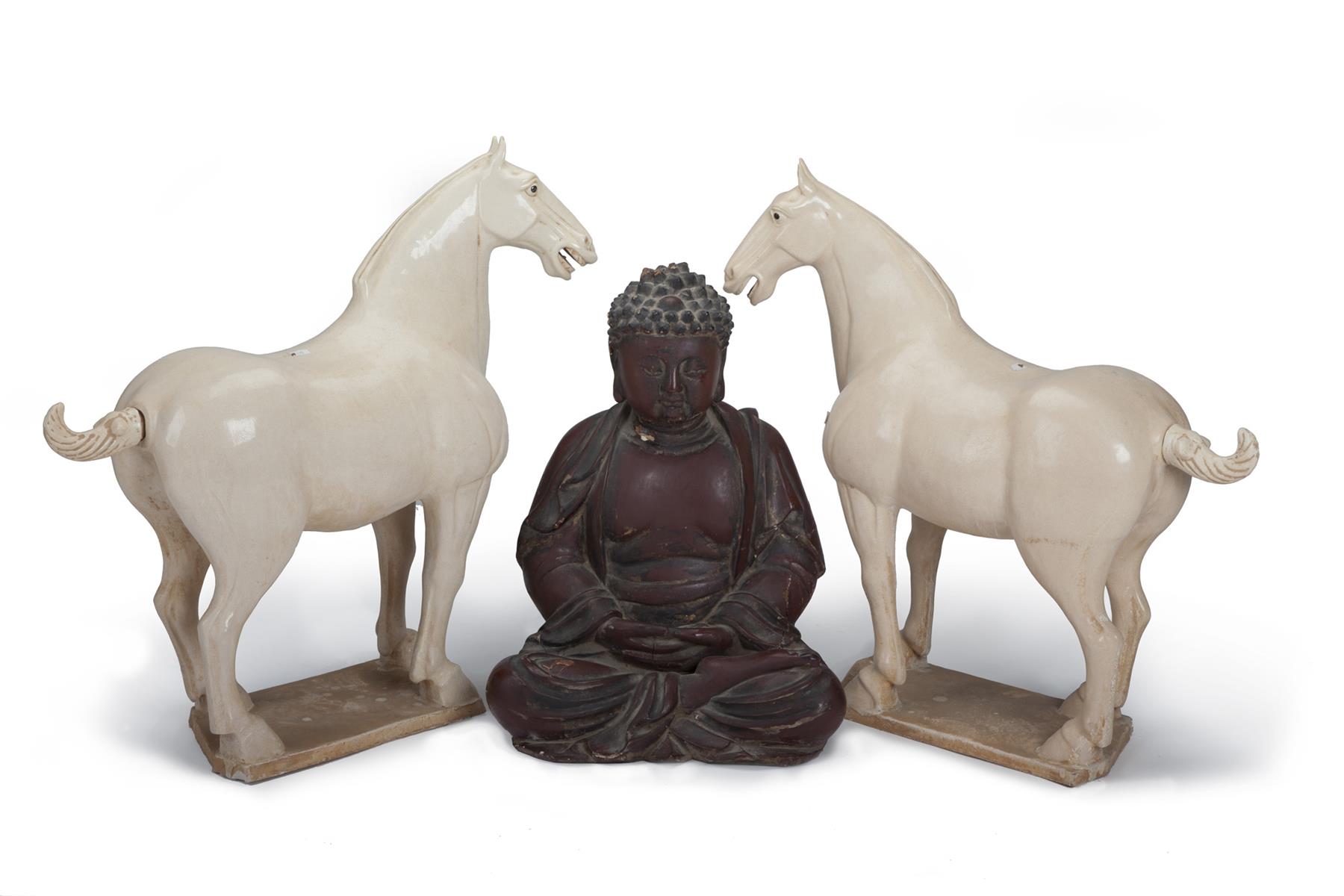 Appraisal: TWO CHINESE HORSES AND A BUDDHA Mid th century Pair