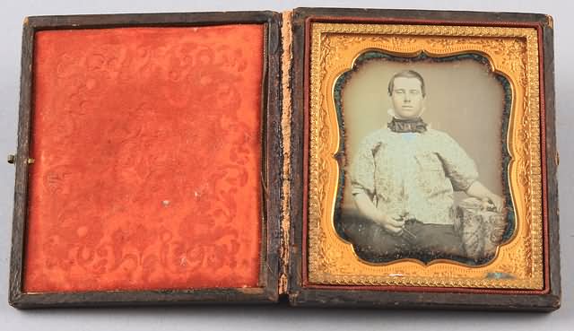 Appraisal: Sixth plate daguerreotype of seated man knees up wearing paisley