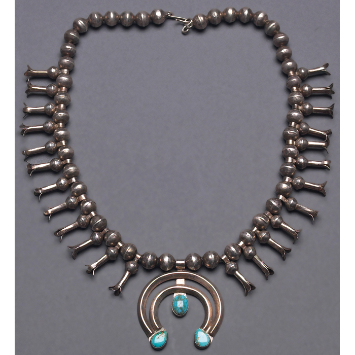 Appraisal: Mexican necklace attribution silver beads flanking a horseshoe shaped pendent