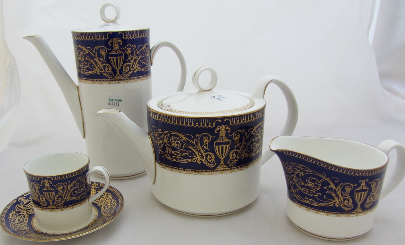 Appraisal: A Royal Worcester part dinner tea and coffee service decorated