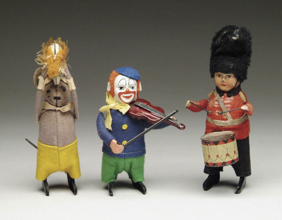 Appraisal: LOT OF SCHUCO FIGURES Violin clown Mouse that twirls little