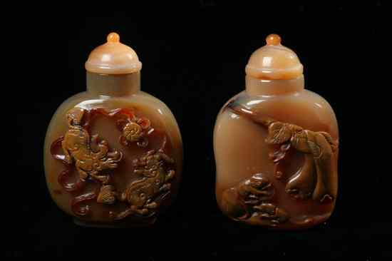 Appraisal: TWO CHINESE CAMEO AGATE SNUFF BOTTLES th century Flattened ovoid-form