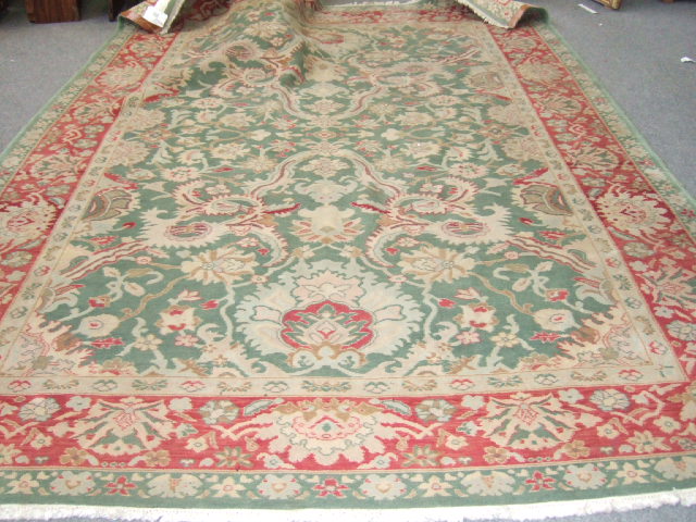 Appraisal: A modern carpet of Sultanabad design possibly Persian the sage