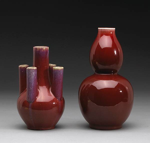 Appraisal: Two flamb red glazed vases th Century The first of