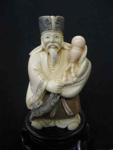 Appraisal: Chinese Carved Ivory Figurine of a Man holding gourd in