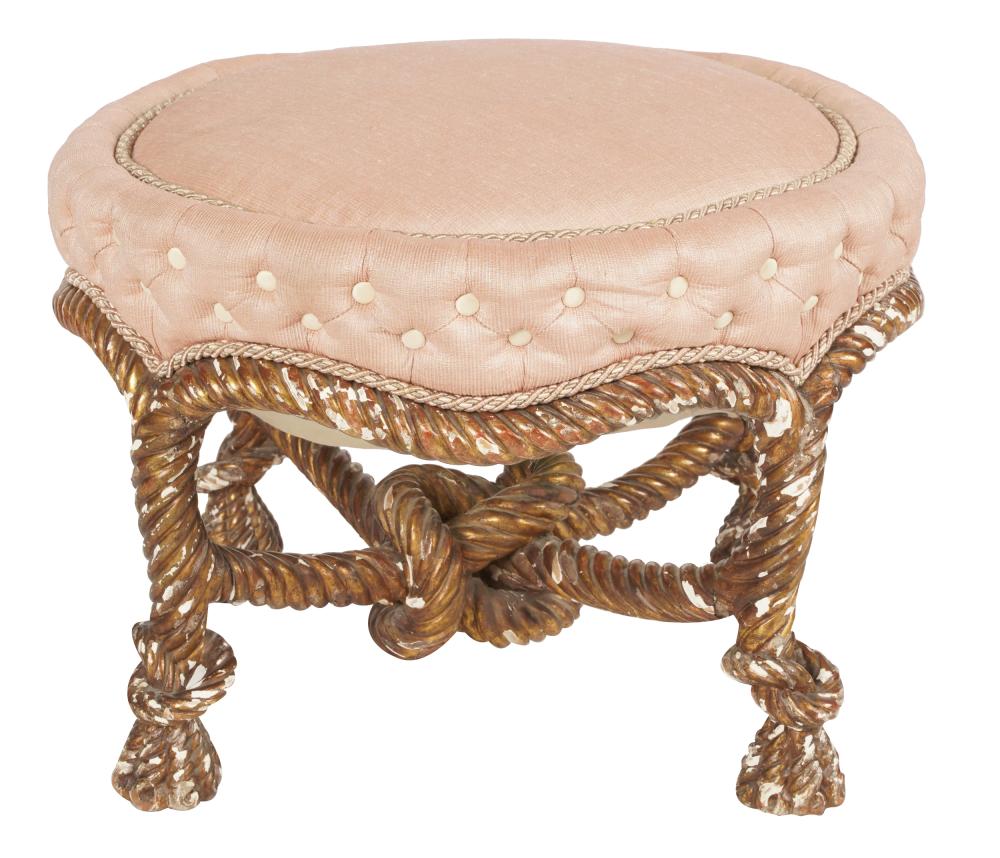 Appraisal: GILTWOOD OTTOMANthe top covered with peach-colored fabric the base carved